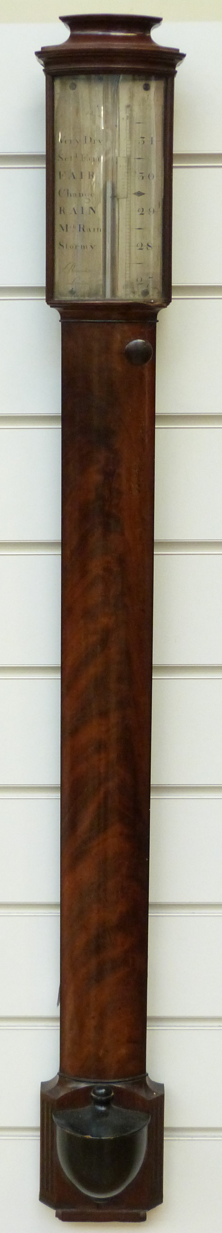 A Georgian Flame Mahogany Stick Barometer By Ramsden. Sold For £2800